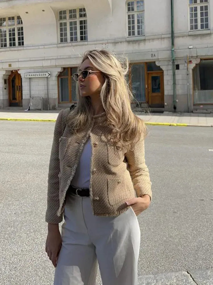 Elegant damesvest met knoopsluiting en zakken – Nilda